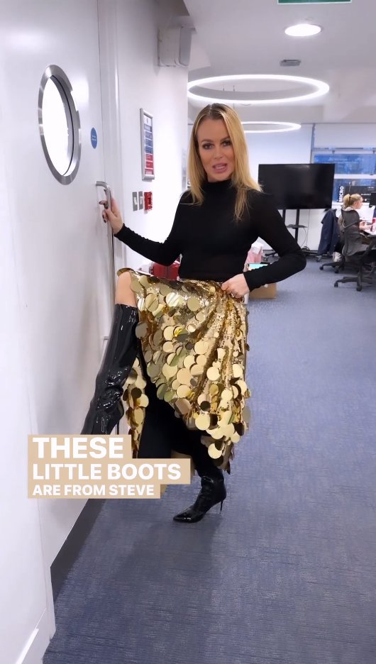 Amanda Holden showing off a gold sequin skirt.