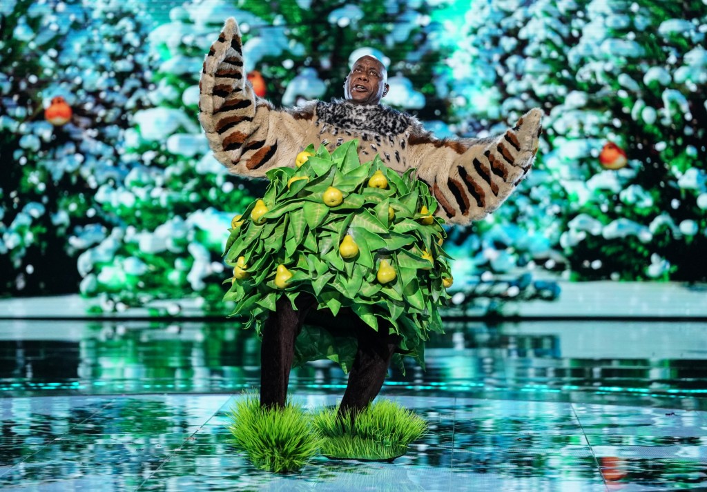 From Bandicoot TV The Masked Singer Christmas Special: on ITV1 and ITVX Pictured: Ainsley Harriot This photograph is (C) Bandicoot TV and can only be reproduced for editorial purposes directly in connection with the programme or event mentioned above, or ITV plc. This photograph must not be manipulated [excluding basic cropping] in a manner which alters the visual appearance of the person photographed deemed detrimental or inappropriate by ITV plc Picture Desk. This photograph must not be syndicated to any other company, publication or website, or permanently archived, without the express written permission of ITV Picture Desk. Full Terms and conditions are available on the website www.itv.com/presscentre/itvpictures/terms For further information please contact: michael.taiwo1@itv.com